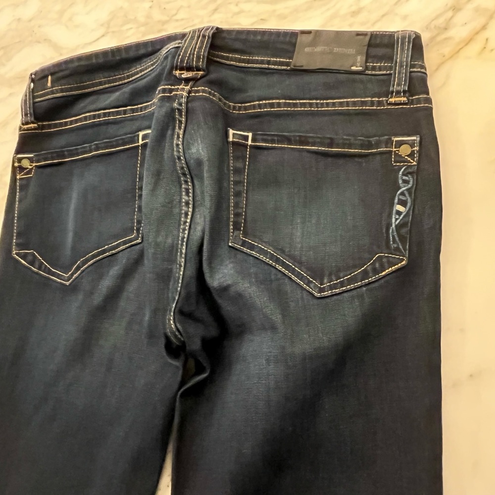 Like new, Genetic Denim, dark blue wash, 6” side zippers at the bottom, size 27